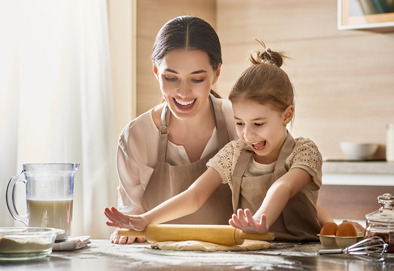 Mom spend s time with cooking with child