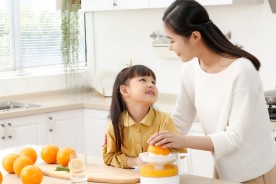 Mom with child cooking together
