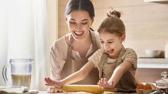 Mom spend s time with cooking with child