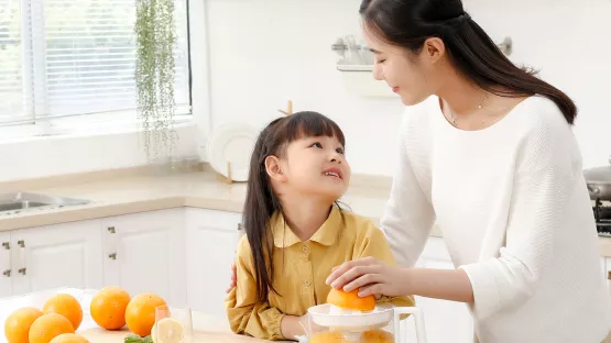 Mom with child cooking together